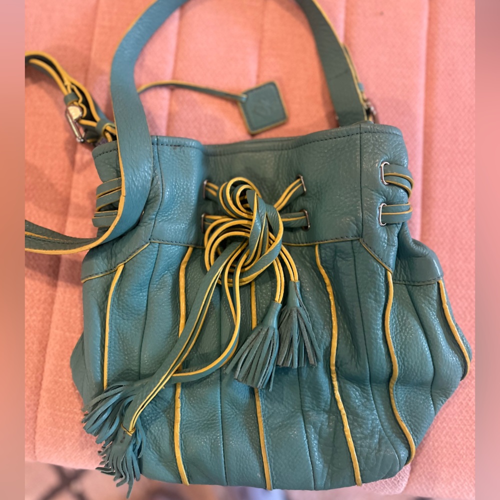 Donald J Pilner teal and light yellow hobo bag